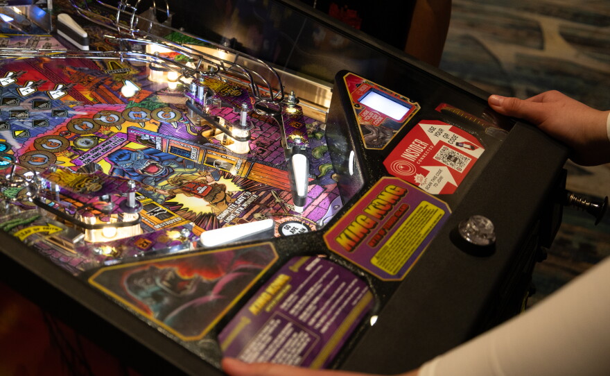 A man plays "King Kong" pinball at Stern Pinball’s Pop-Up Arcade during Comic-Con in San Diego on July 24, 2026.