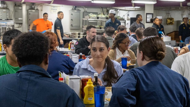 Photo of Rep. Sara Jacobs sitting for a meal with sailors on the mess decks of the USS Abraham Lincoln Sunday, Sept. 27, 2026.