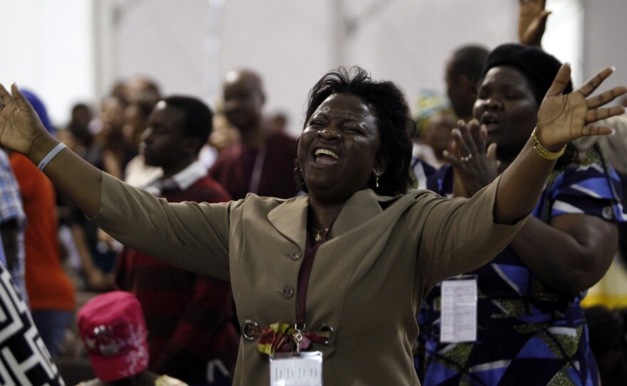 Members of the Redeemed Christian Church of God pray at Redemption Camp in Floyd, Texas, in 2009. The church is on a mission to spread to every city in North America.