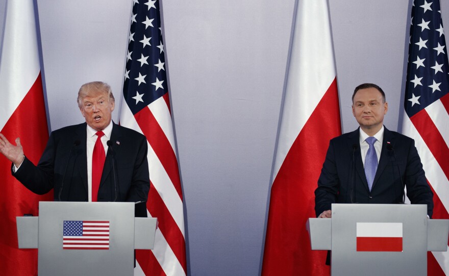 President Trump speaks during a news conference with Poland's President Andrzej Duda on Thursday in Warsaw.