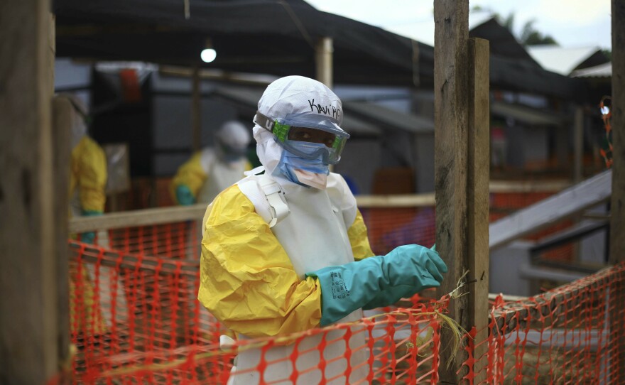 An Ebola health worker is seen at a treatment center in Beni, Eastern Congo, April, 16, 2019.