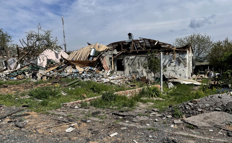 A house in the recently liberated village of Vil'Khivka that was blown apart in fighting between Ukrainian and Russian troops.