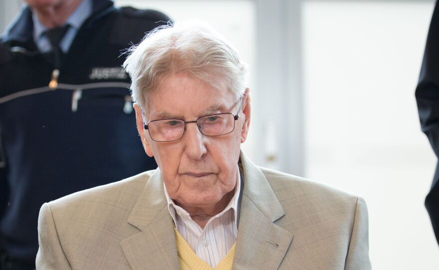 Former Auschwitz guard Reinhold Hanning apologized during his trial for failing to take action against the injustice he witnessed.