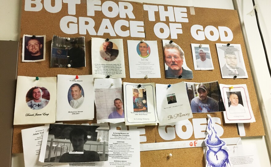 A bulletin board in the detox unit at Recovery Point of Huntington, W. Va., a residential drug and alcohol treatment facility, is covered with photos of former residents who died of their addictions.
