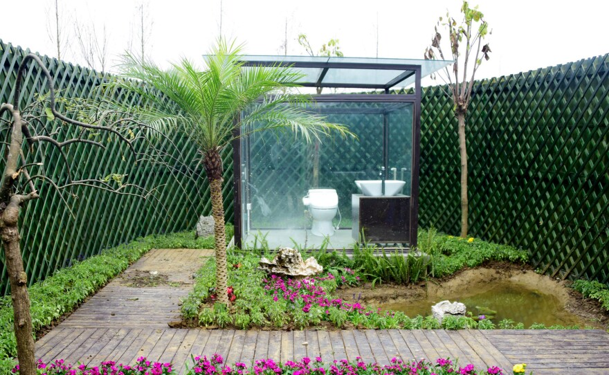 A new public toilet at a park in China's southwestern Guizhou province. Don't worry — the fence keeps it private.