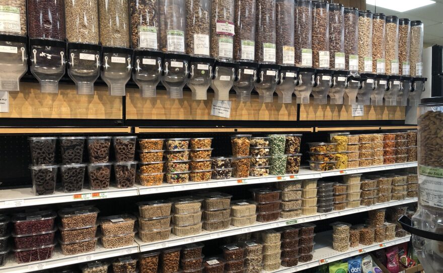 Nuts and dried fruit items at a grocery store.