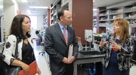 Dr. Roberta Gottlieb (right), director of San Diego State's BioScience Center, explains the building's laboratory facilities to Dr. Elliot Hirshman and his wife Jeri on Hirshman's first day as San Diego State University president, July 5, 2011. 