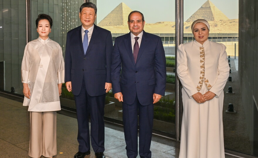 In this photo released by Xinhua News Agency, Chinese President Xi Jinping, second left, and his wife Peng Liyuan, left, pose with Egyptian President Abdel-Fattah el-Sissi and first lady Entissar el-Sissi as they visit the Grand Egyptian Museum in Giza, Egypt on Wednesday, Sept. 2, 2026.