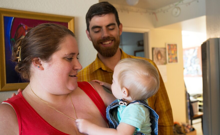 Nicole and Ben Veum, with their little boy, Adrian. Nicole was in recovery from opioid addiction when she gave birth to Adrian, and she worried the fentanyl in her epidural would lead to relapse, but it didn't.