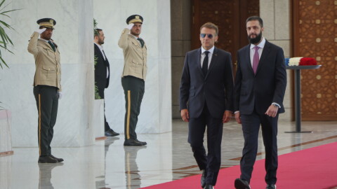 Syrian President Ahmad al-Sharaa, right, meets French President Emmanuel Macron at the presidential palace in Damascus, Syria on Tuesday.