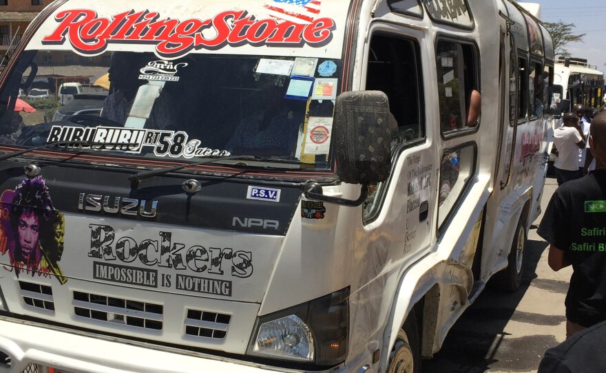 A minibus painted with the Rolling Stones' logo.