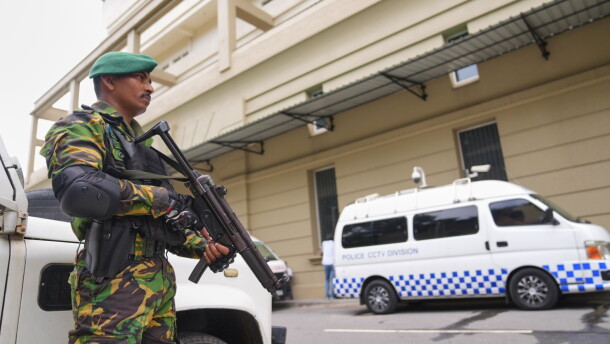 A police commando stands guard at the High Court complex ahead of a verdict related to the 2019 Easter bombings in Colombo, Sri Lanka, Tuesday, Sept. 22, 2026.