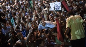Tens of thousands of Libyans celebrate the partial fall of Tripoli in the hands of the Libyan rebels on August 21, 2011 in Benghazi, Libya.