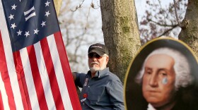 Carl Seymour of Florida was among those protesting the new health care bill this weekend. Florida is one of 12 states already planning a lawsuit to challenge  the federal legislation, saying it undermines states' authority.