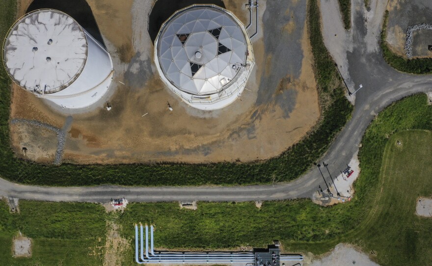 Fuel holding tanks are pictured at Colonial Pipeline's Dorsey Junction Station in Woodbine, Maryland in May 2021, the month that a cyberattack disrupted gas supply to the eastern U.S. for several days.
