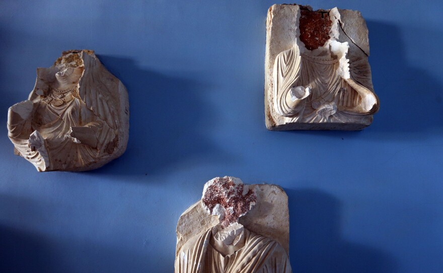 Beheaded and mutilated statues are seen in the destroyed museum in the ancient Syrian city of Palmyra on Thursday. Syrian troops backed by Russian forces recaptured Palmyra on March 27, 2016.