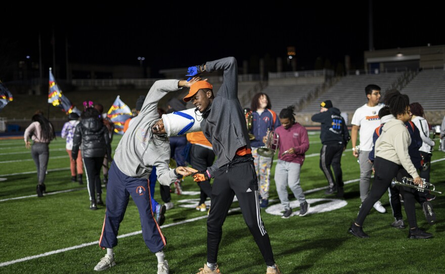 Tory James (R) practices before heading to Alabama for the Battle of the Bands.