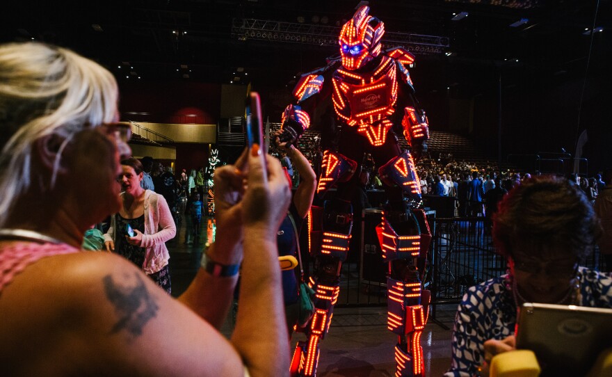 A performer helps entertain the crowd before the official opening of the Hard Rock Hotel and Casino in Atlantic City, N.J. on Thursday.