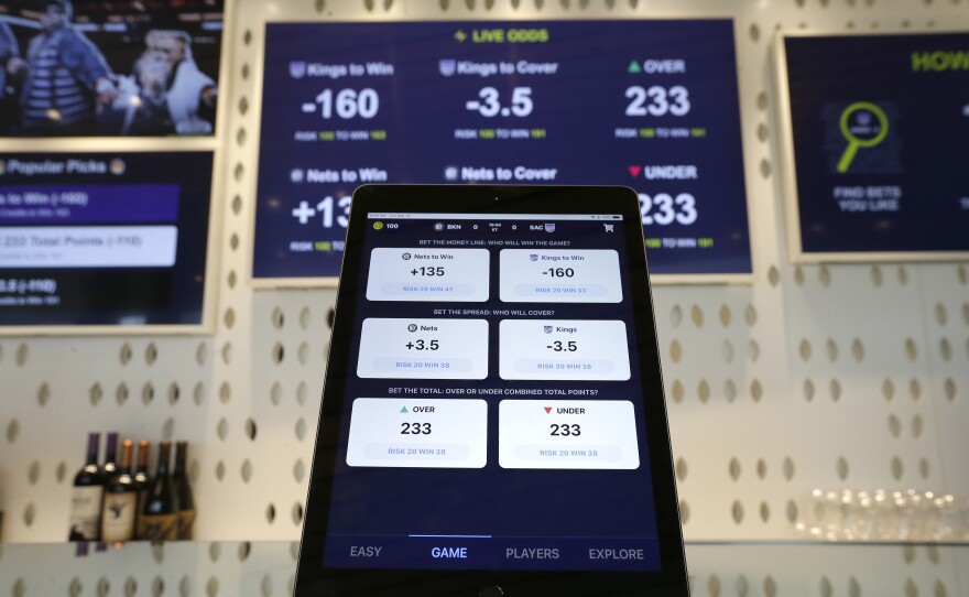 In this March 19, 2019, file photo, an iPad displays the types of free bets that could be placed at the Golden 1 Center's Skyloft Predictive Gaming Lounge in Sacramento, Calif. The campaign that could bring legalized sports betting to California has become the most expensive ballot-initiative fight in state history. Two rival proposals on the November ballot are pitting wealthy Indian tribes against FanDuel, DraftKings and other online gambling companies, in a contest over what could become the nation's most lucrative marketplace.