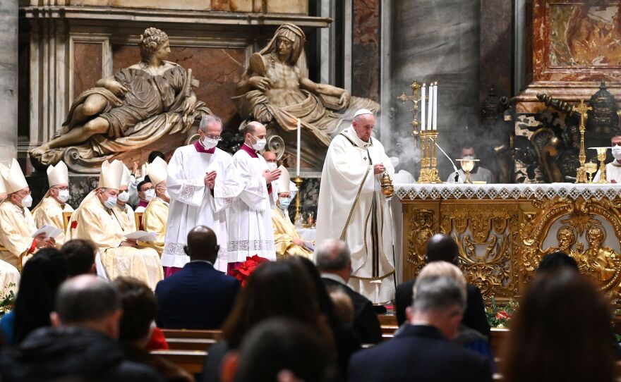 Pope Francis celebrates Christmas Eve Mass on Thursday at St. Peter's Basilica in the Vatican, as Italy went back into lockdown measures due to the COVID-19 pandemic.