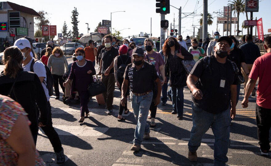 Travelers cross Rail Court toward the San Ysidro Transit Center and the Port of Entry, May 27, 2021.