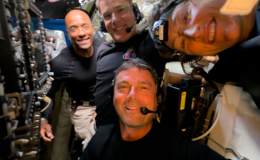 From left: Artemis II crew members Victor Glover, Jeremy Hansen, Reid Wiseman and Christina Koch take a selfie during Monday's lunar fly-by.