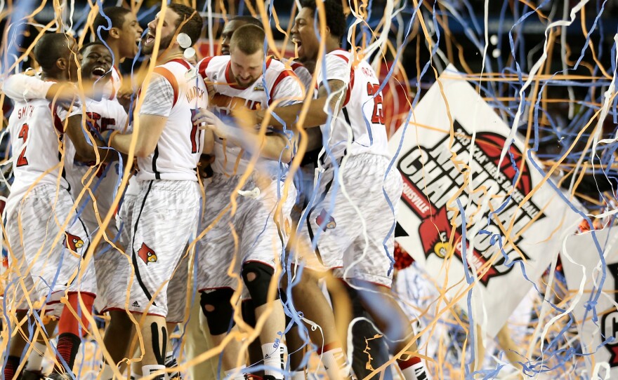 The Louisville Cardinals celebrate after they won the 2013 NCAA men's basketball national championship against Michigan. On Tuesday, the NCAA upheld its 2017 ruling that Louisville must vacate its records from 2011 to 2015, including its national title.