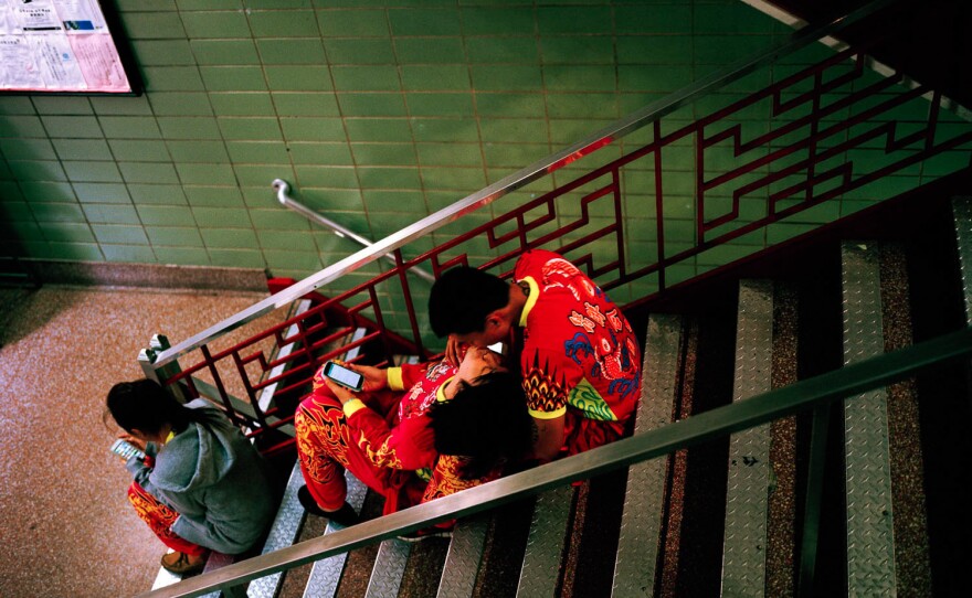 Lion dance couple, Chinatown, New York City, 2012