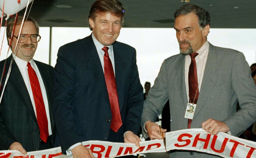 Back when commercial lenders were eager to do business with him, Donald Trump briefly operated an airline. In this 1989 picture, Trump attends a ribbon-cutting for the venture at Boston's Logan International Airport.