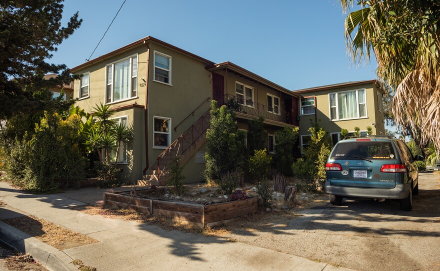 Nitin Bajaj and his wife Nimisha purchased this small apartment building almost ten years ago. The family has gradually fixed it up, removing bars from the window, painting it. Early on, Bajaj had to drag a dismantled abandoned van out of the yard. "There was a bumper here, and a door there," he says.