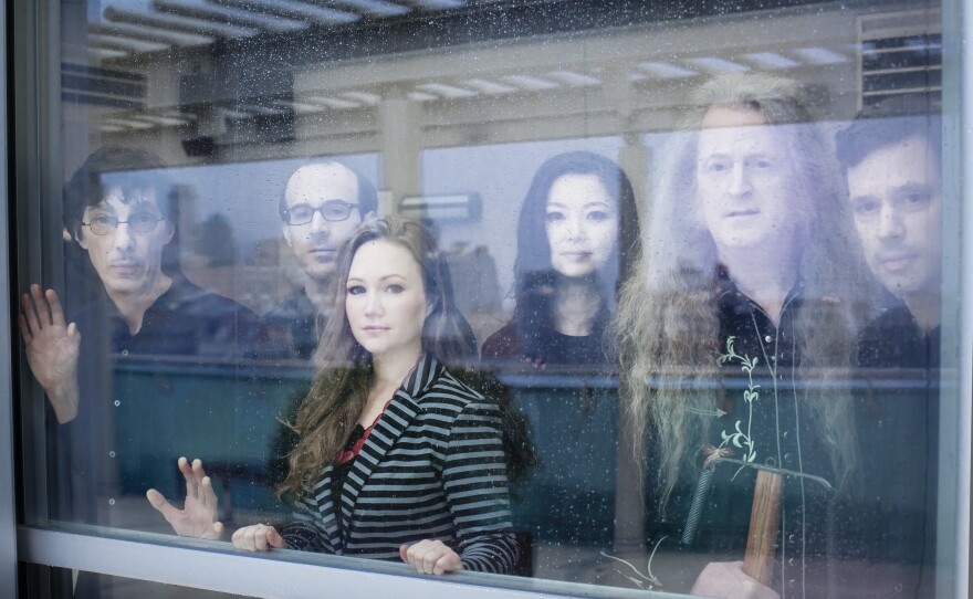 A portrait of the members of the new music ensemble Bang On a Can All-Stars.