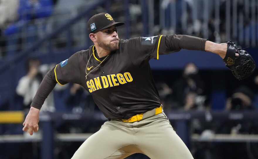 San Diego Padres starting pitcher Joe Musgrove throws to the plate during the first inning of a baseball game against the Los Angeles Dodgers at the Gocheok Sky Dome in Seoul, South Korea Thursday, March 21, 2024, in Seoul, South Korea.