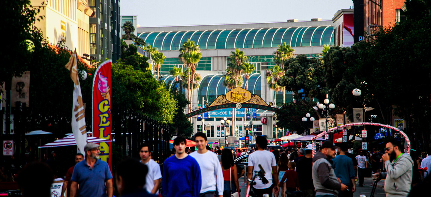People walking the streets of the Gaslamp Quarter at 5:20pm, as Comic-Con closes its doors, Sunday, July 23, 2023. The international convention might be over, but the spirit of the event has not left the streets, animating each corner with cosplay displays and other activations still in place.