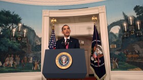 President Barack Obama makes a statement on the economy in the Diplomatic Room of the White House after meeting with members of the financial services industry on December 14, 2009 in Washington, DC.