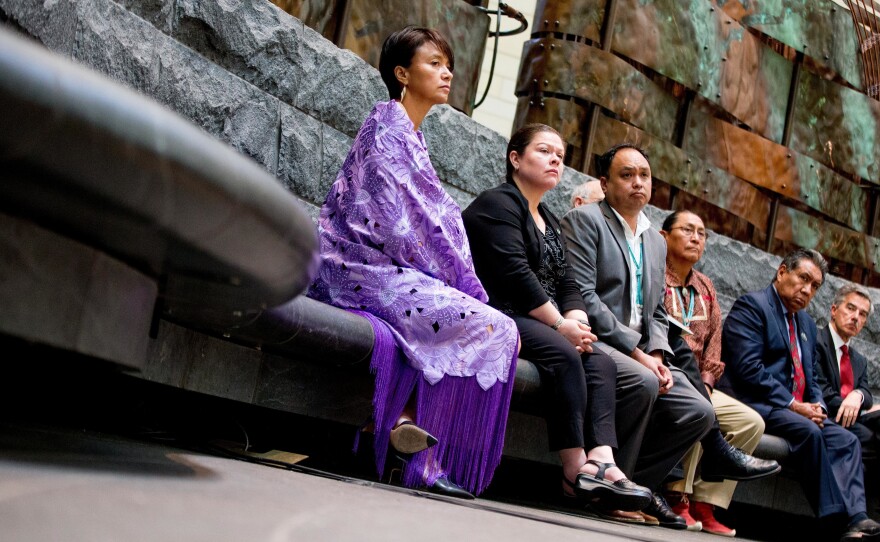 U.S. officials and members of Native American Nations attend an "emergency meeting" at the Smithsonian National Museum of the American Indian, in Washington, D.C., on Tuesday. They were gathered to object to a Paris auction house's upcoming sale of objects sacred to Native Americans.