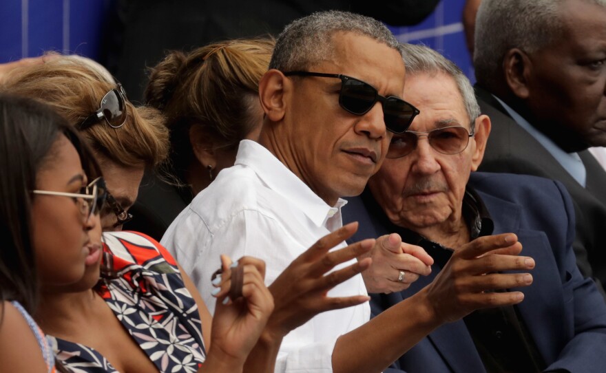 U.S. President Barack Obama and Cuban President Raul Castro visit during an exhibition game between the Cuban national team and the Major League Baseball team Tampa Bay Devil Rays at the Estado Latinoamericano March 22, 2016 in Havana, Cuba.