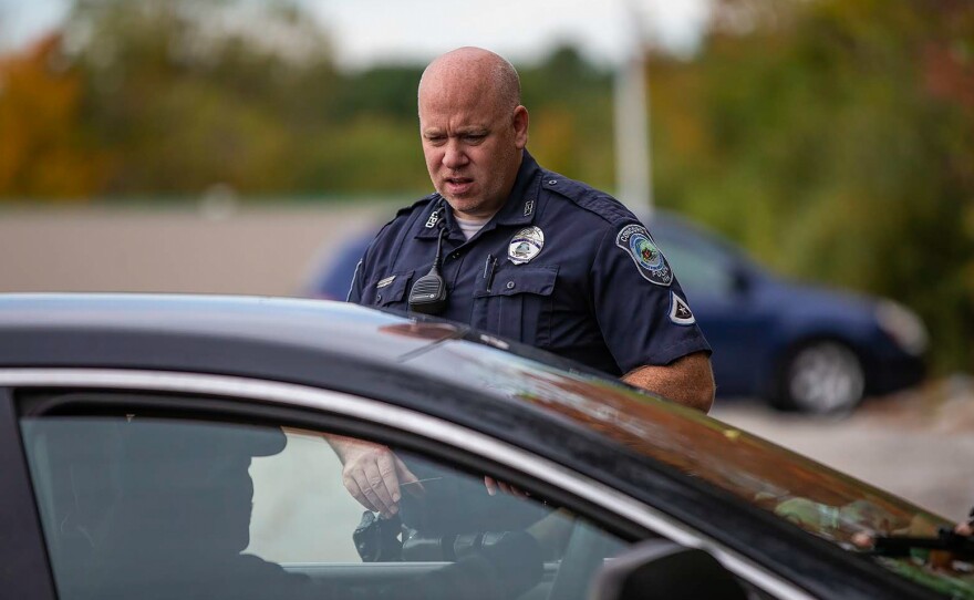 Officer Brian Cregg checks in with a man who says he is homeless and living in his car in Concord, N.H. In Concord, as in many parts of the Northeast, widespread use of meth is new, police say, and is changing how they approach interactions with people who seem to be delusional.