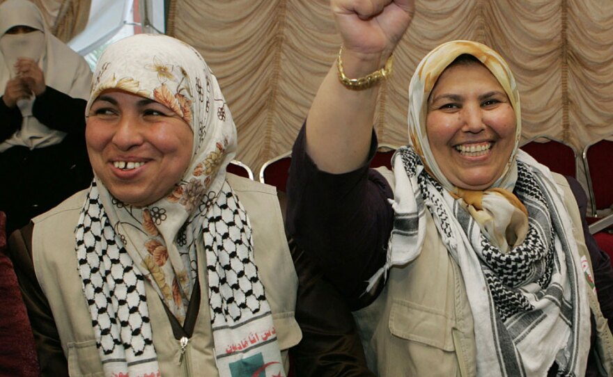 Pro-Palestinian activists crossed the Israeli-controlled Allenby Bridge at the border with Jordan on Wednesday after Israel began deporting people detained after the flotilla raid.