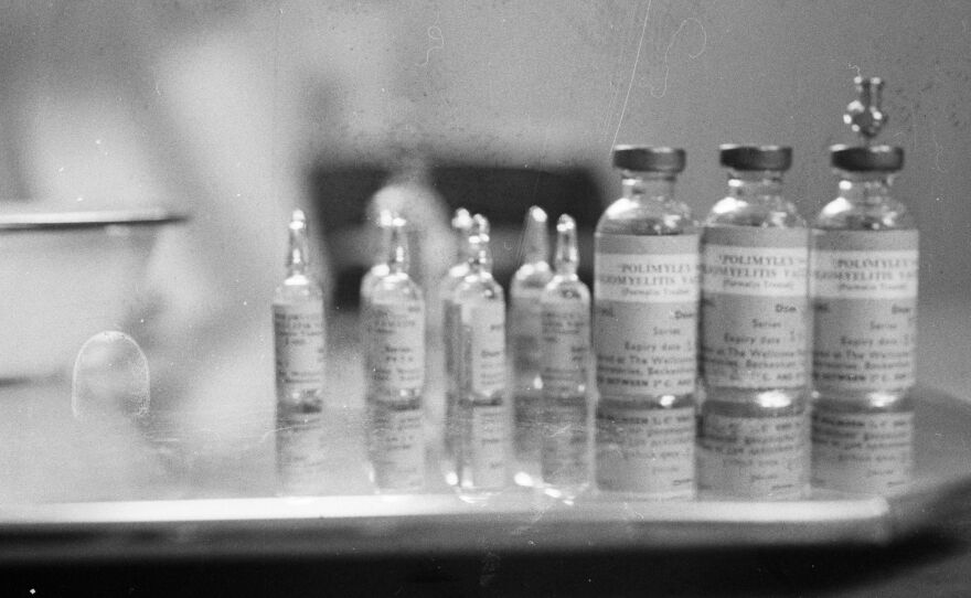 April 1959: Bottles containing the polio vaccine. First developed by John Franklin Enders, further work undertaken by Albert Sabin resulted in a vaccine that could be administered orally.