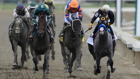 Paco Lopez, far right, atop Napoleon Solo, leads the pack to win the 151st running of the Preakness Stakes horse race, Saturday, May 16, 2026, at Laurel Park in Laurel, Md.