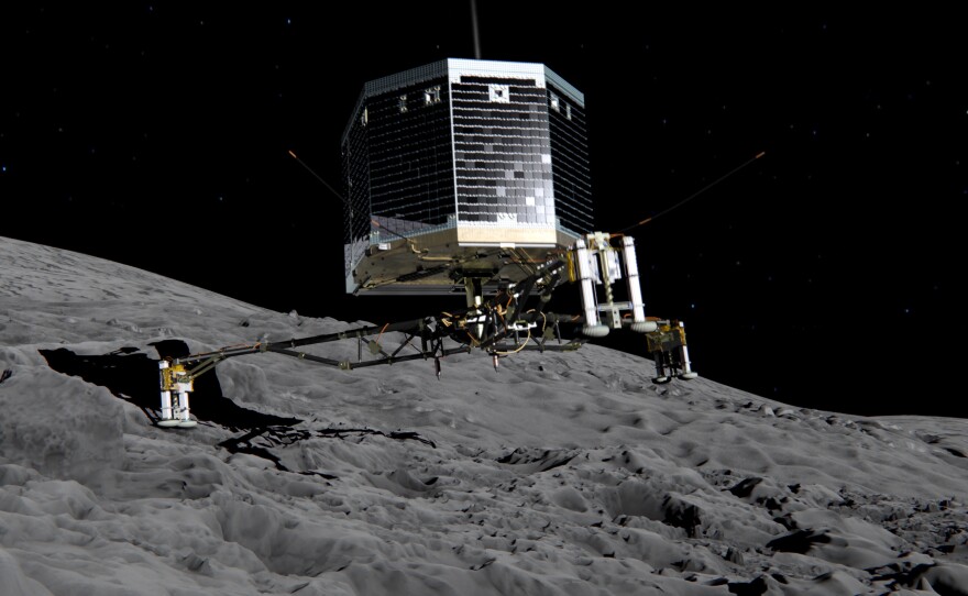 A photo illustration from the European Space Agency shows what a landing by the Philae robotic craft might look like, on the 67P/Churyumov-Gerasimenko comet. The lander is heading toward the comet Wednesday morning.