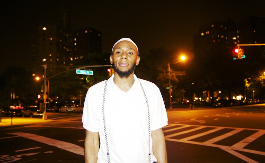 Yasiin Bey (formerly known as Mos Def), former Roosevelt Houses resident. He is a hip-hop artist and actor who has appeared on Broadway (Topdog/Underdog), television (Showtime's Dexter), and in film (Monster's Ball, Be Kind Rewind, Cadillac Records). This photo was taken in front of the Farragut Houses in the Brooklyn neighborhood of Dumbo.