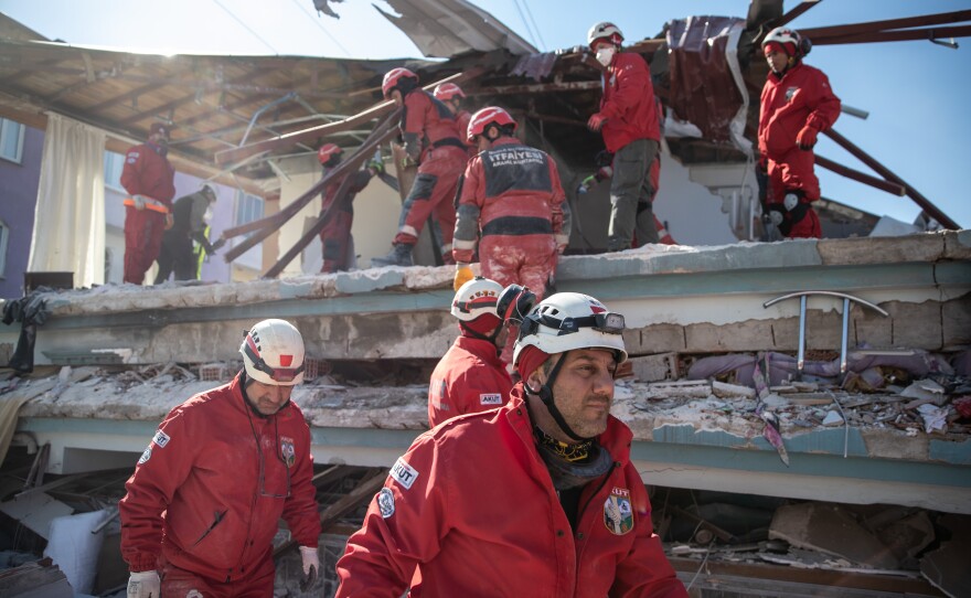 Rescuers work at the site of a collapsed building in Hatay, Turkey on Thursday. A 7.8-magnitude earthquake hit near Gaziantep, Turkey, in the early hours of Monday, followed by another 7.5-magnitude tremor just after midday.