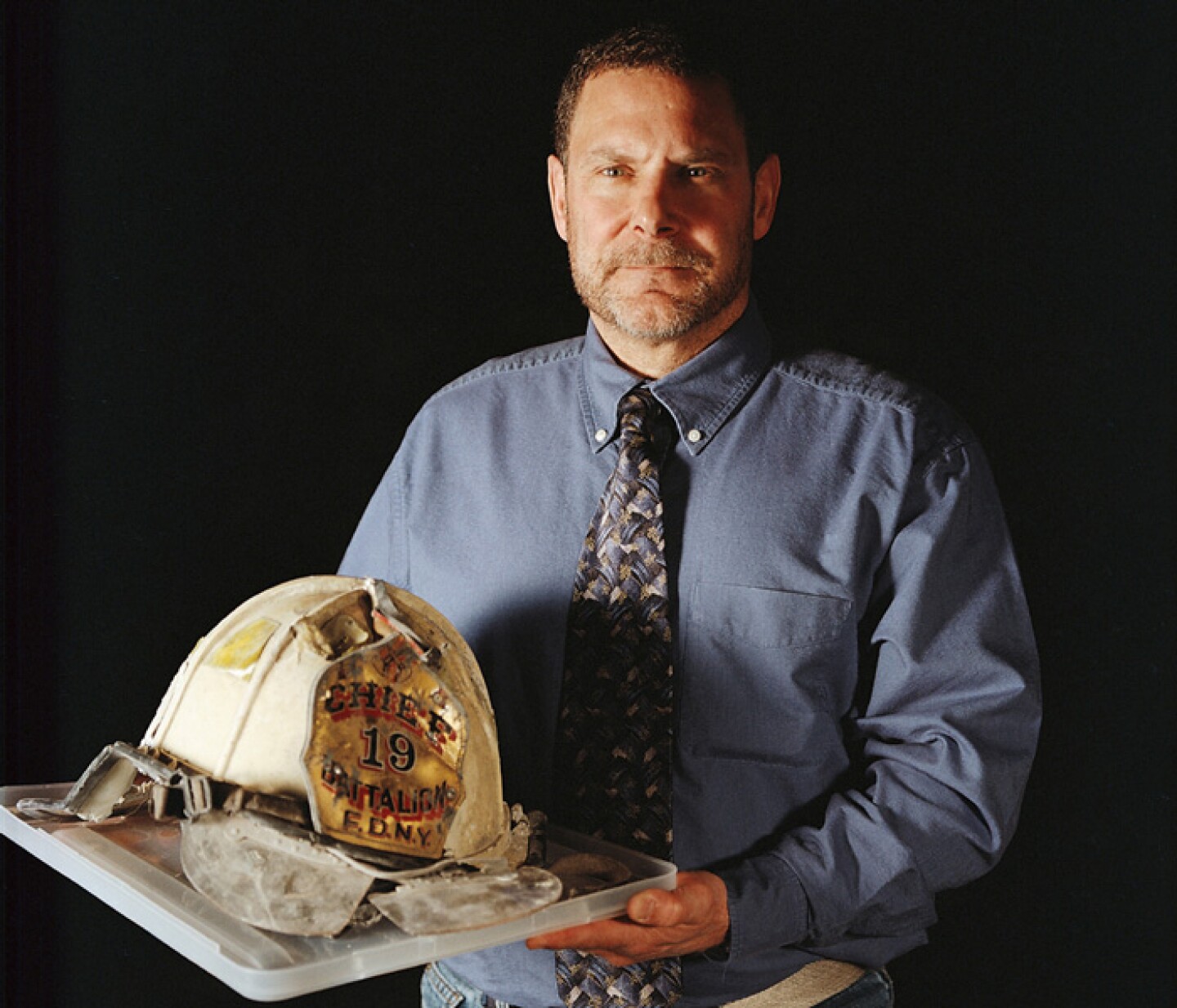 Mike Telesca, retired Battalion Chief with FDNY'S Safety Battalion, eventually recovered his beloved helmet which he lost when the World Trade Center's south tower collapsed.