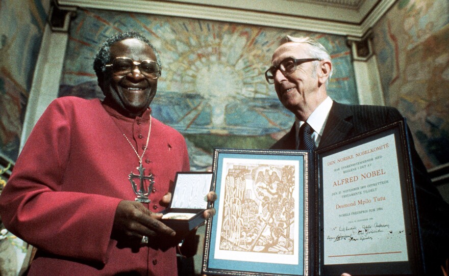 South African Bishop Desmond Tutu (left) receives the 1984 Nobel Peace Prize from Nobel Committee Chairman Egil Aarvik during the annual ceremony in Oslo, Norway, in 1984.