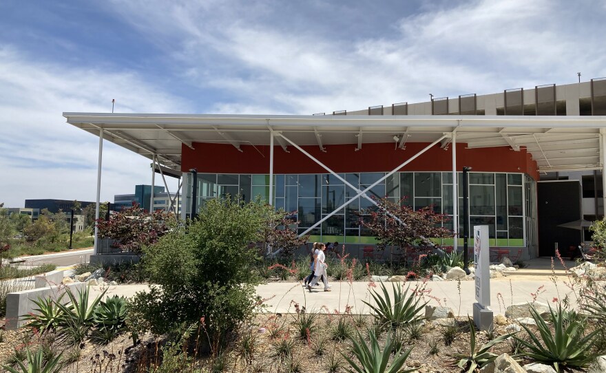Students walk in front of student housing near UC San Diego, July 26, 2022.