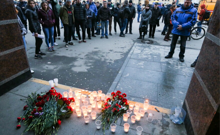 Flowers and candles in memory of the St. Petersburg Metro explosion victims on Monday at Sennaya station.