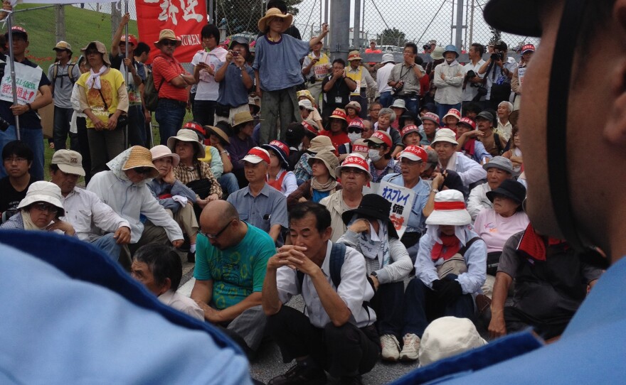 Protesters block an entrance to U.S. Marine Corps Air Station Futenma in Ginowan, Japan.