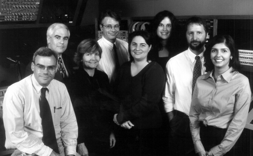 KPBS Newsroom in the 1990s set a new standard for radio journalism.  Pictured from left to right: Scott Horsley, Michael Marcotte, Alison St John, Erik Anderson, Carrie Kahn, Nancy Greenlease, Tom Fudge, and Christine Noriega.
