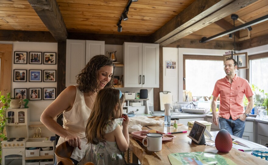 Meghan Lena, her husband, Eric Schimelpfenig, and their daughter at home in Bernardston, Mass.